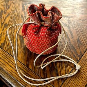 beautiful bag.All beaded gold & red 
Great condition- About 7" x 7"